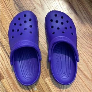 Purple crocs.